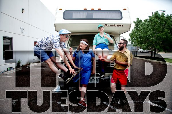 4 people in front of an old RV, the words THIRD TUESDAY cover the bottom of the photo.