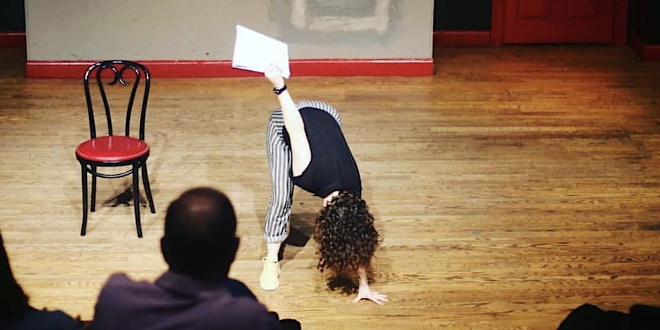 A person leans over with one hand in the air holding a piece of paper.