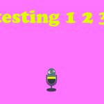 A small drawing of a microphone with eyes in the center bottom of a pink backround with the words "Testing 123"
