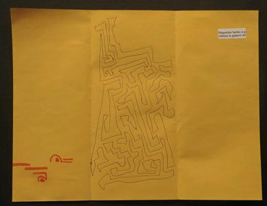 A yellow piece of paper with three sections. On the left, there are very minimal red lines and shapes at the bottom. In the middle, there is a maze-like pattern filling most of the space. On the right, there is a small piece of paper attached with French words on it.