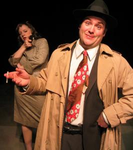 In the foreground, a 1940’s male detective stands with a cigarette in his hand looking pleased while the female in the background points a gun at him.