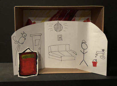 A diorama in a small cardboard box. The background is a black-and-white line drawing of a room with a couch, door, and disco ball. On the left, a cat is leaping through the air. On the right, a stick figure stands near a red bucket that a faucet is dripping into. Leaning against the background drawing, on the left, is a large painted rectangle.
